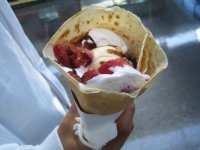 Strawberries, Whipped Cream and Chocolate Syrup Crepe