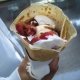 Strawberries, Whipped Cream and Chocolate Syrup Crepe